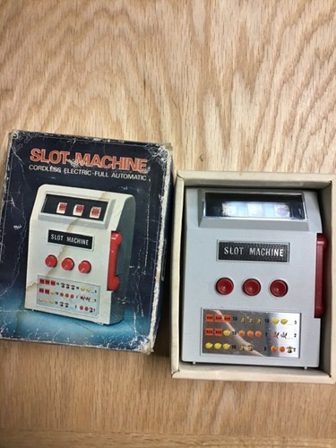 1971 handheld slot machine - slot,